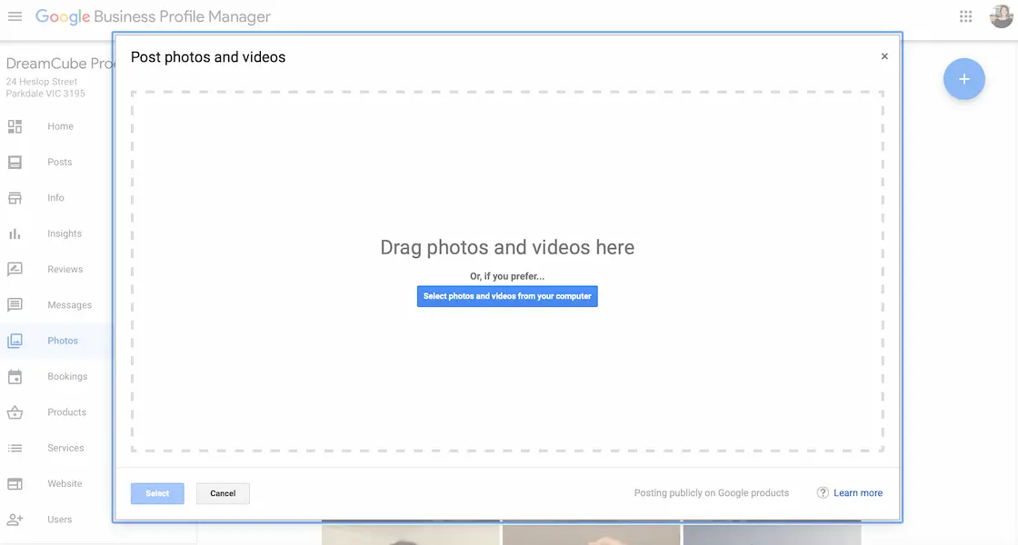 This image shows the Google Business Profile Manager for DreamCube Productions, featuring a "Post photos and videos" dialog box. It has an option to drag or select files from the computer, with "Select" and "Cancel" buttons below. The background includes a left-side menu with various profile management options.